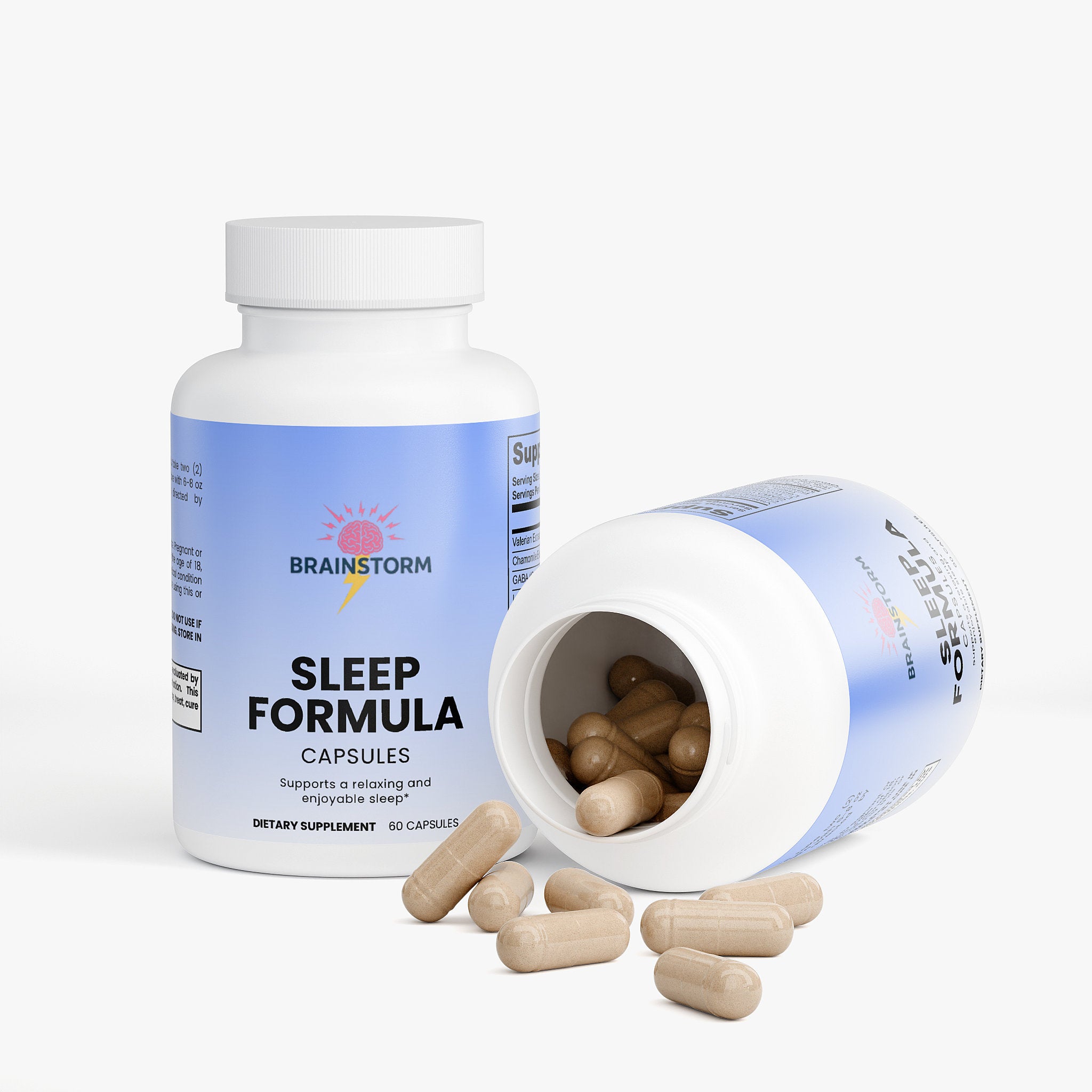 Sleep formula capsules with open bottle tipped over spill Sleep formula capaules on a white background