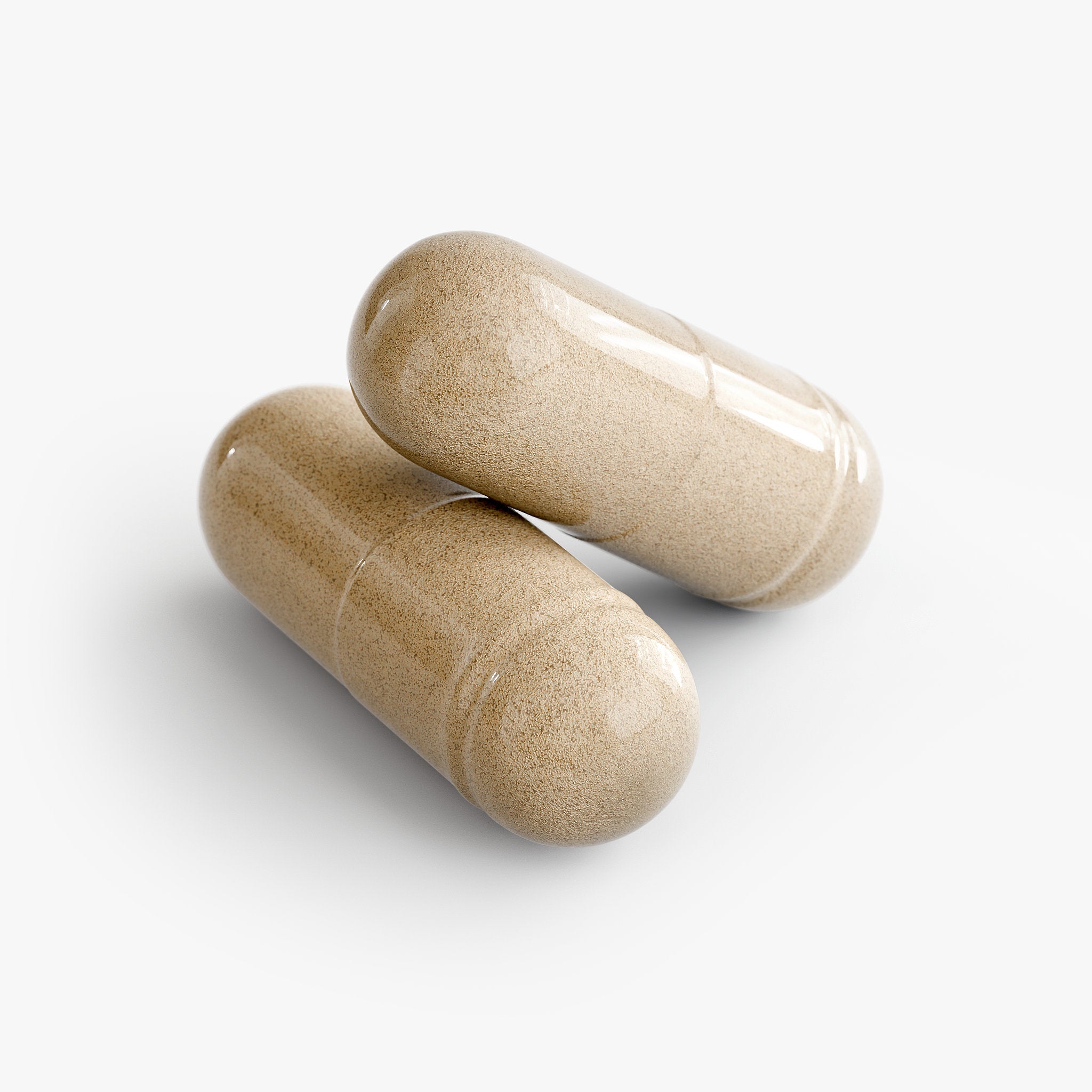 Two beige Sleep Formula capsules on a white background