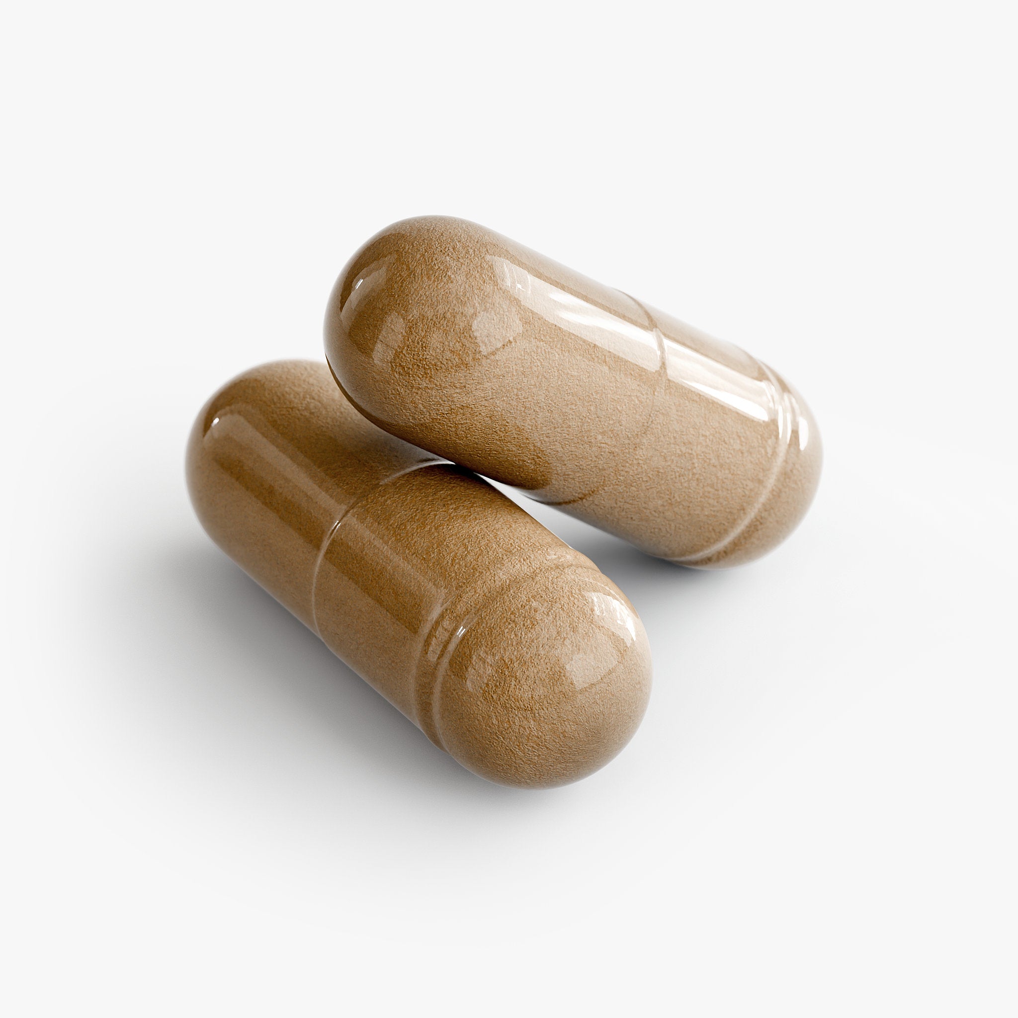 Two brown liver support capsules on a white background
