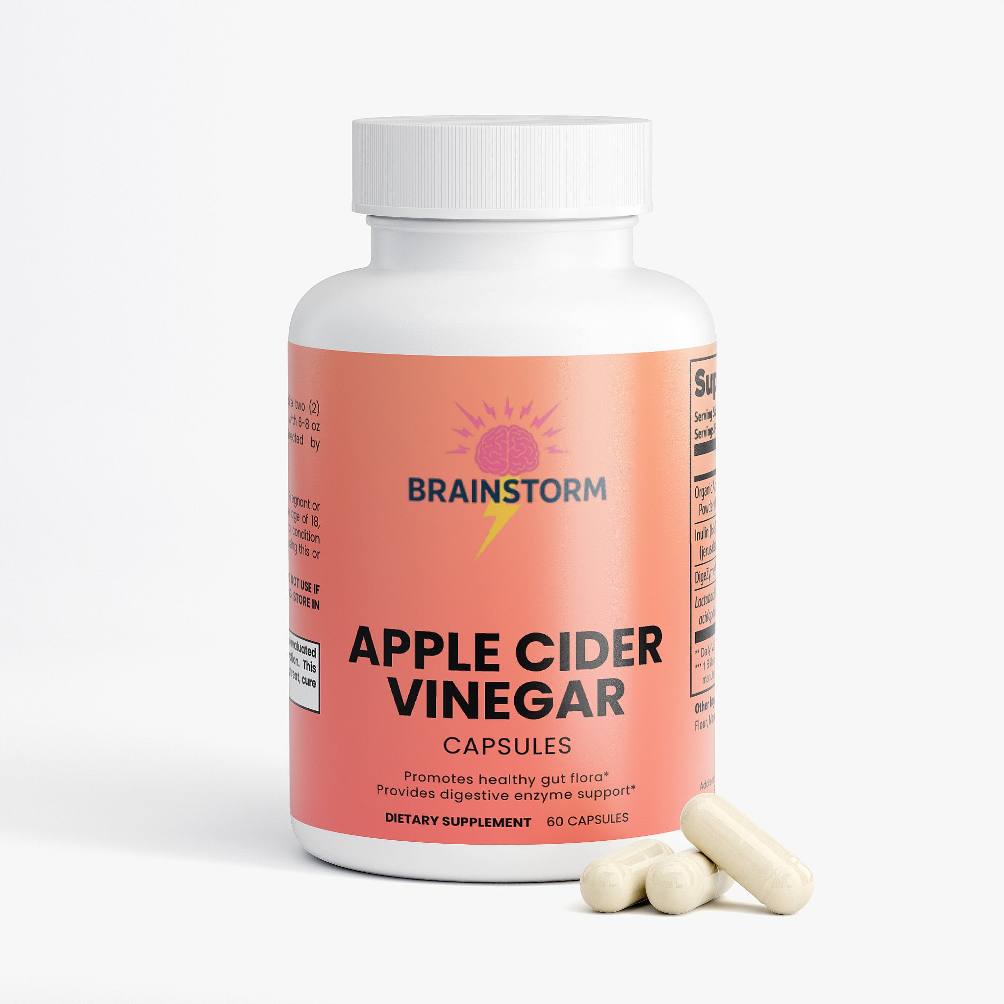 Bottle of Apple Cider Vinegar capsules by Brainstorm with a pink label and Apple Cider Vinegar capsules on the side on a white background