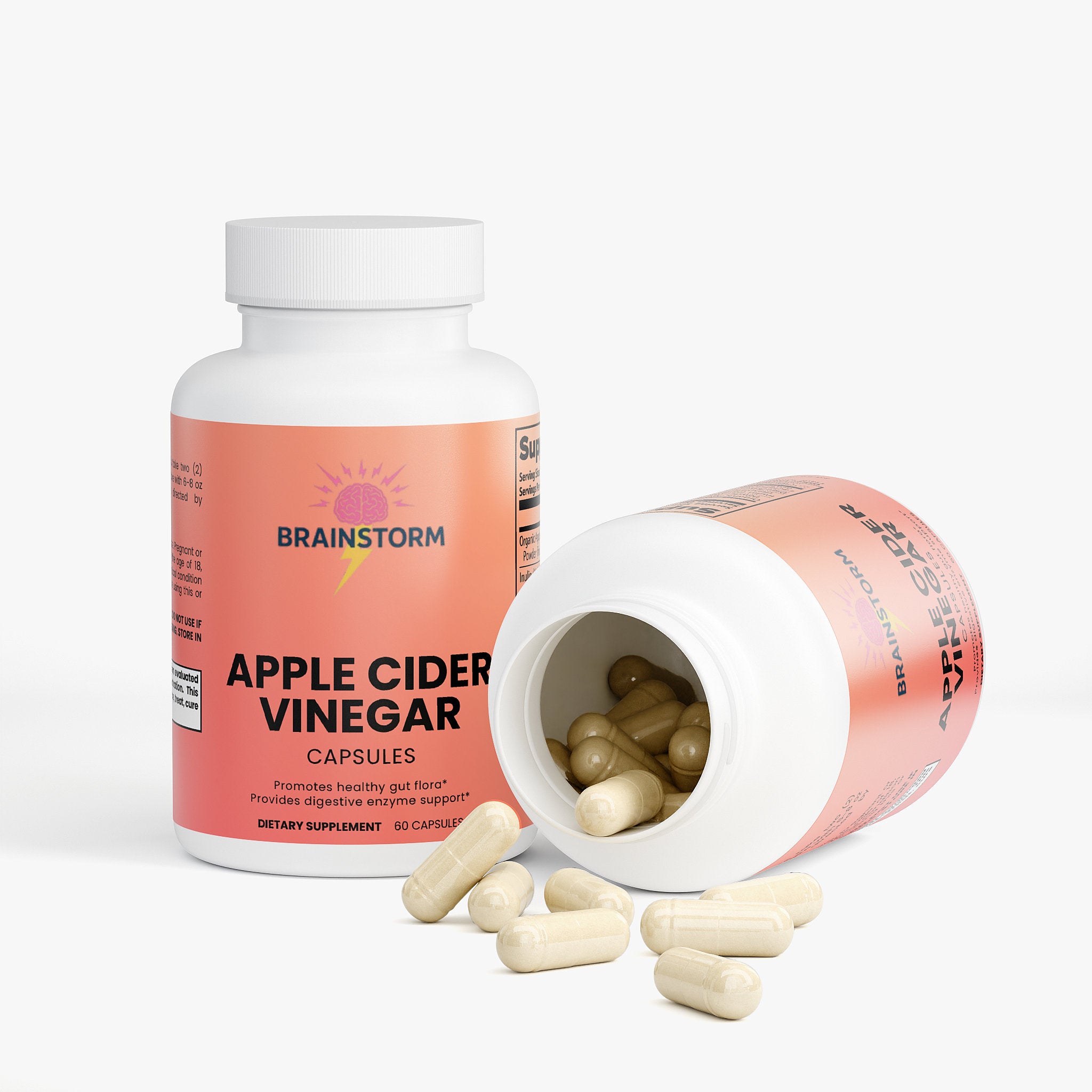 Apple cider vinegar capsules by Brainstorm with open bottle and capsules falling out on a white background