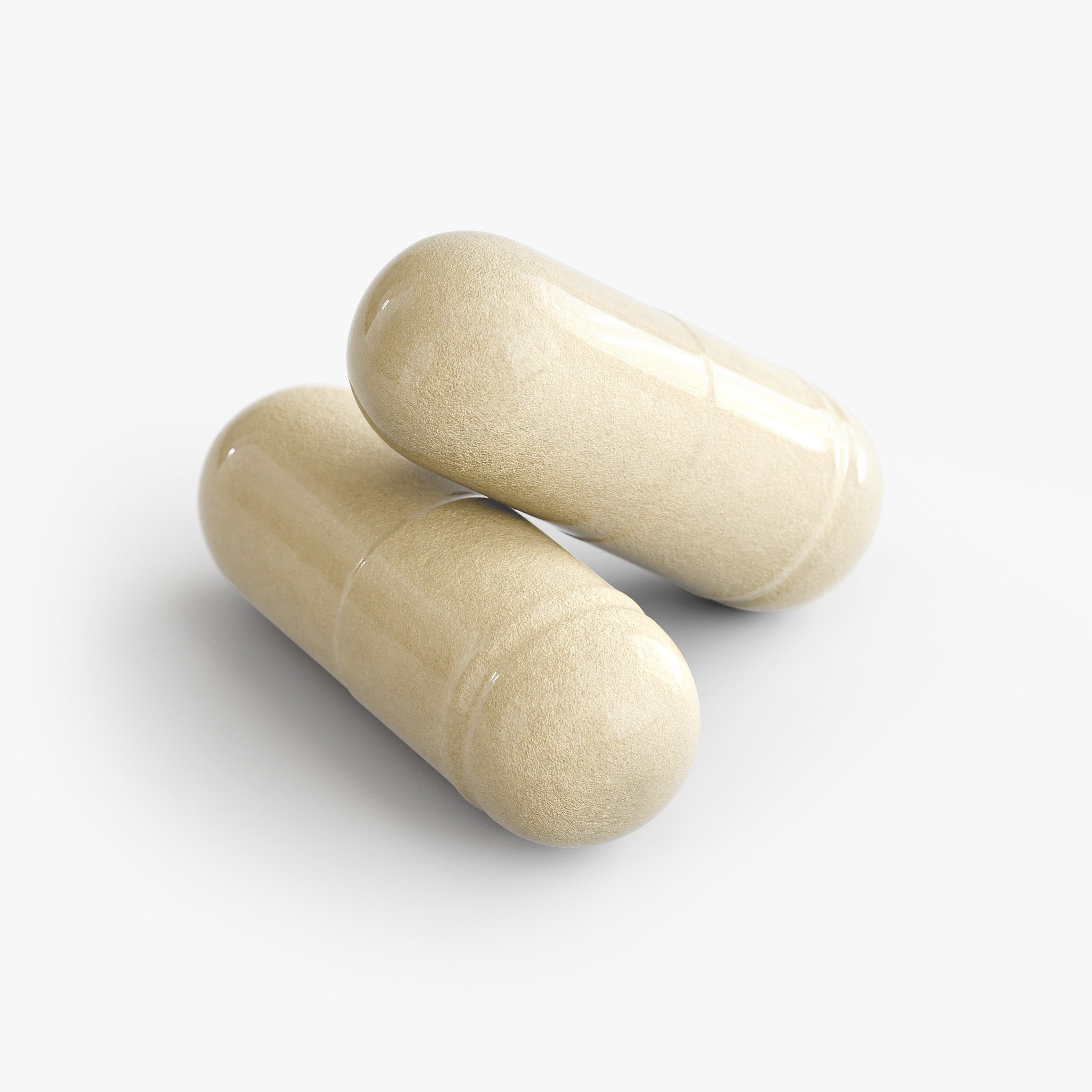 Two beige apple cider vinegar capsules on a white background