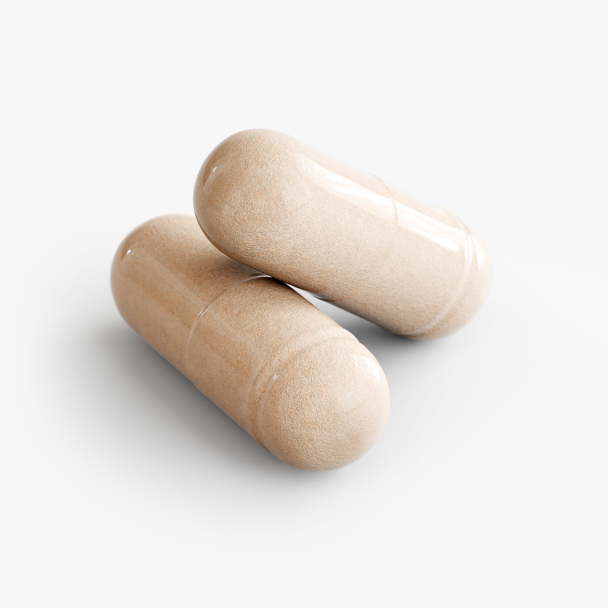 Two beige Ashwagandha with black pepper  capsules on a white background 