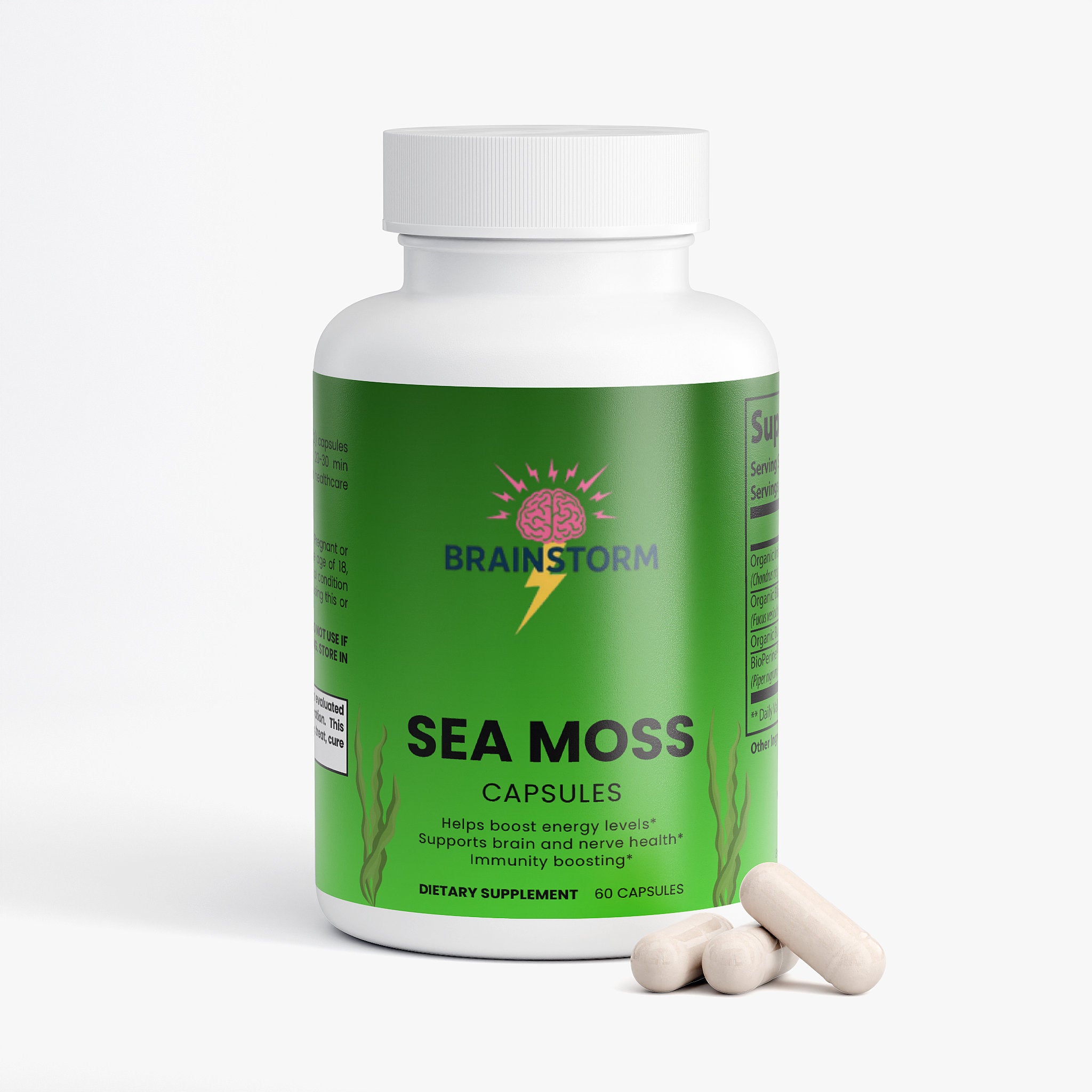 Bottle of Sea Moss capsules with a green label and sea moss capsules on the side on a white background